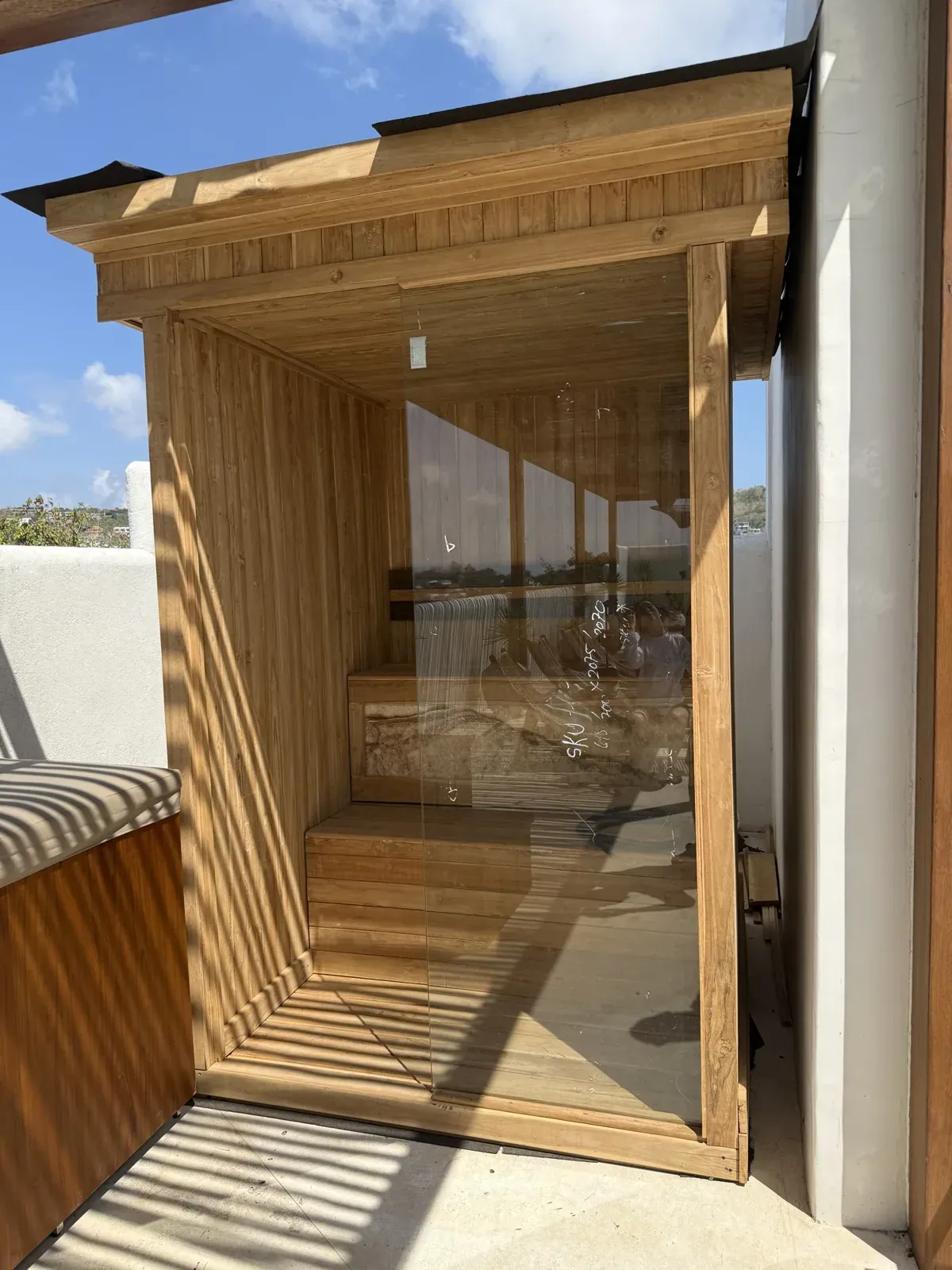 Warm timber, glass and a layout that fits the surrounding courtyard.